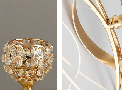 Geometric crystal candle holder with wrought iron frame in gold electroplated finish, 15cm height