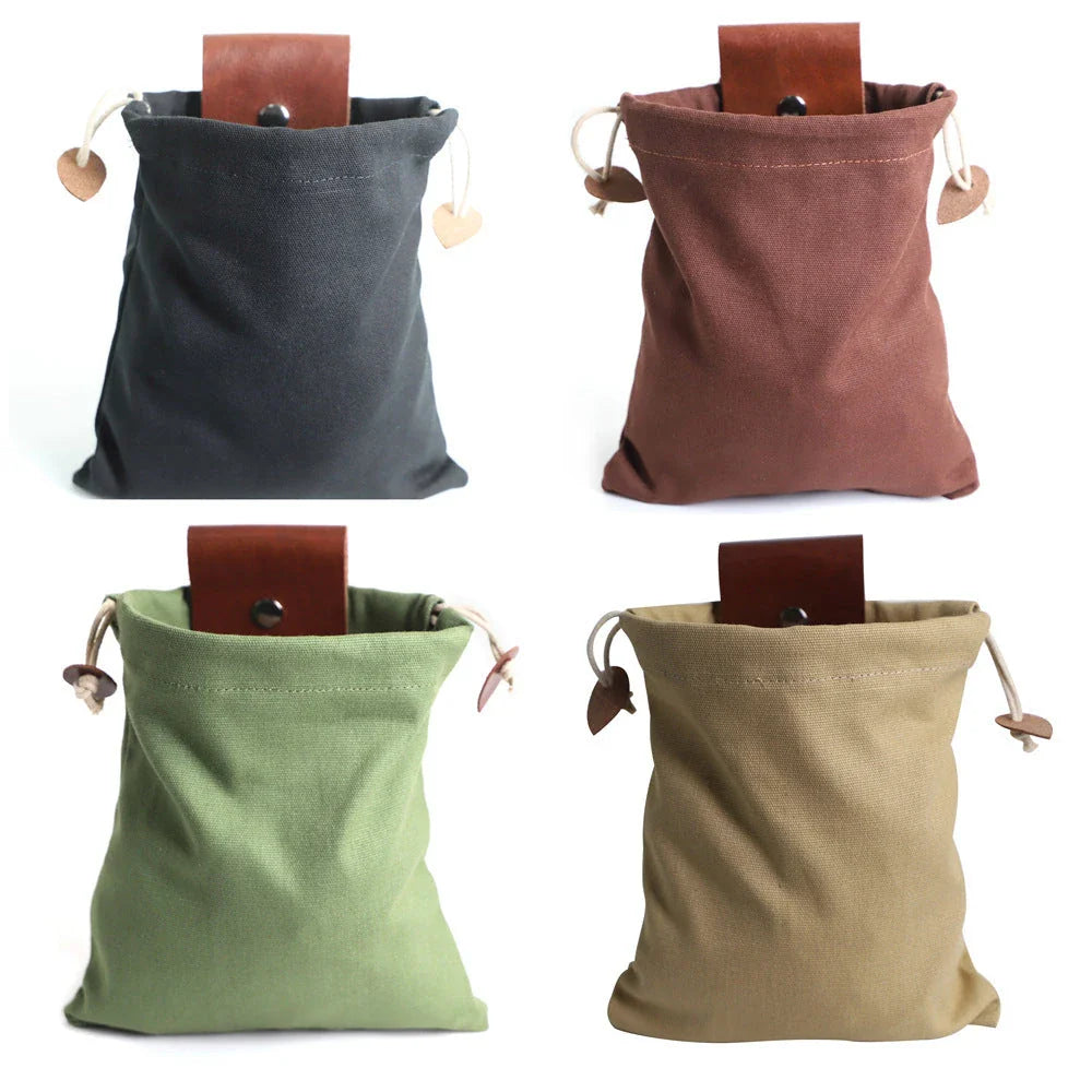 Rugged and versatile waxed canvas hiking waist bag with belt loop for outdoor adventures and berry foraging