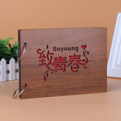 Handmade wooden loose leaf photo album with various unique designs