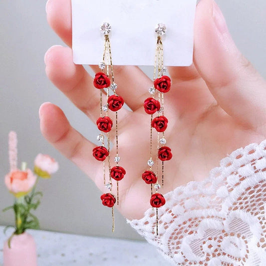 Elegant rose blossom earrings featuring delicate floral designs and tassel accents in a variety of styles