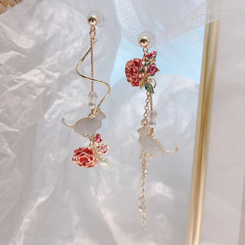 Elegant rose blossom earrings featuring delicate floral designs and tassel accents in a variety of styles