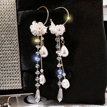 Elegant rose blossom earrings featuring delicate floral designs and tassel accents in a variety of styles