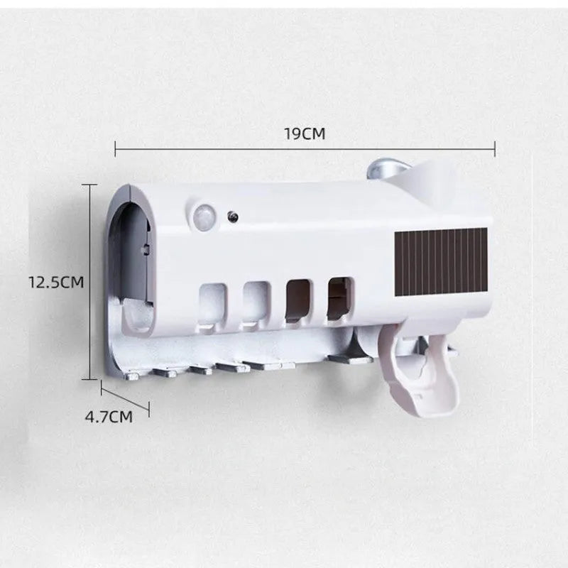Black wall-mounted UV toothbrush steriliser with automatic toothpaste squeezer showing infrared sensor and solar panel