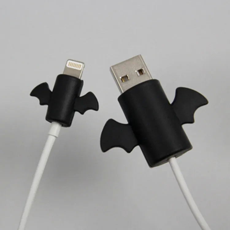 White and black silicone protective covers for mobile phone charging and data cables showing two size options