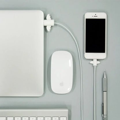 White and black silicone protective covers for mobile phone charging and data cables showing two size options
