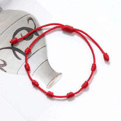 7-knot Evil Eye Bracelet 6 Pack with adjustable braided rope and blue charm