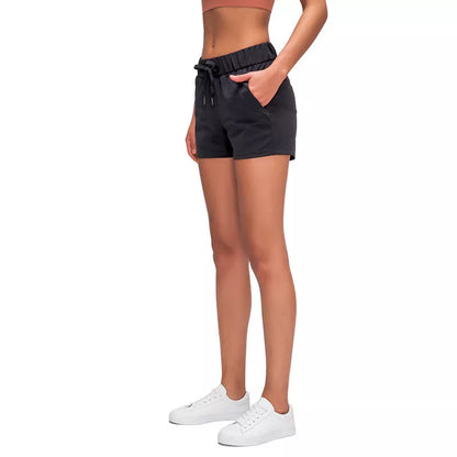Women's lace wide loose sports shorts in black, ice grey, moss green, and dark blue