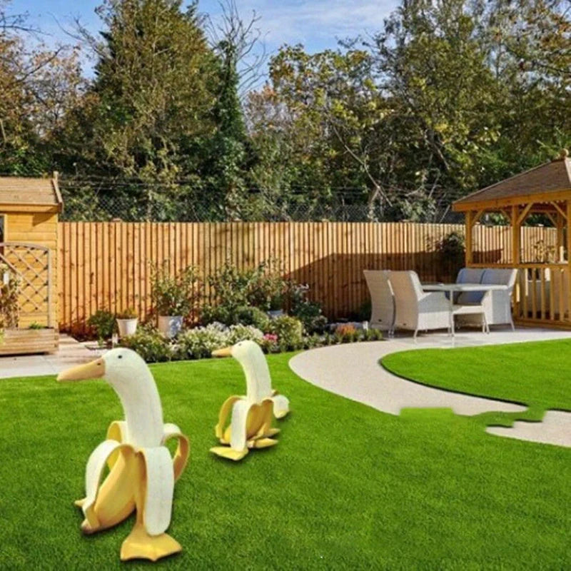 Vibrant yellow banana duck resin garden statue for outdoor decoration