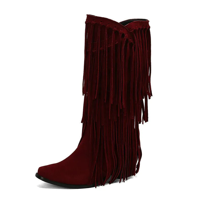 Women's black suede high boots with tassel detail, chunky heel, and square toe.