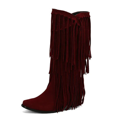 Women's black suede high boots with tassel detail, chunky heel, and square toe.