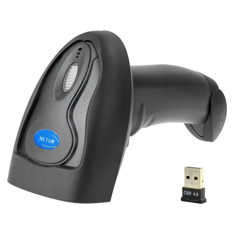 Black wireless handheld laser barcode scanner with USB cable on a desk