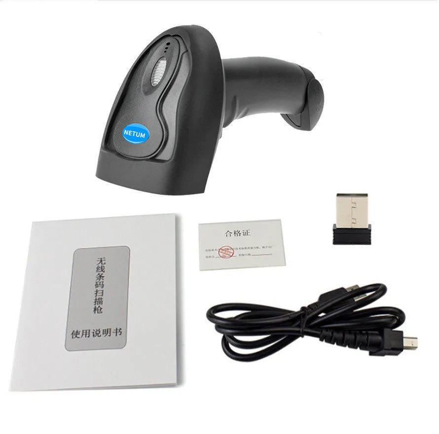 Black wireless handheld laser barcode scanner with USB cable on a desk