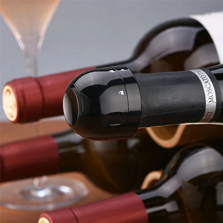 Premium black champagne and wine bottle stoppers with vacuum seal technology to preserve freshness and carbonation
