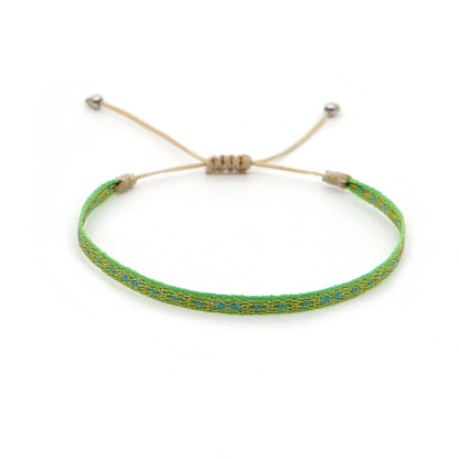 Hand-woven bohemian style bracelet with Spanish vintage and Nepal ethnic influences