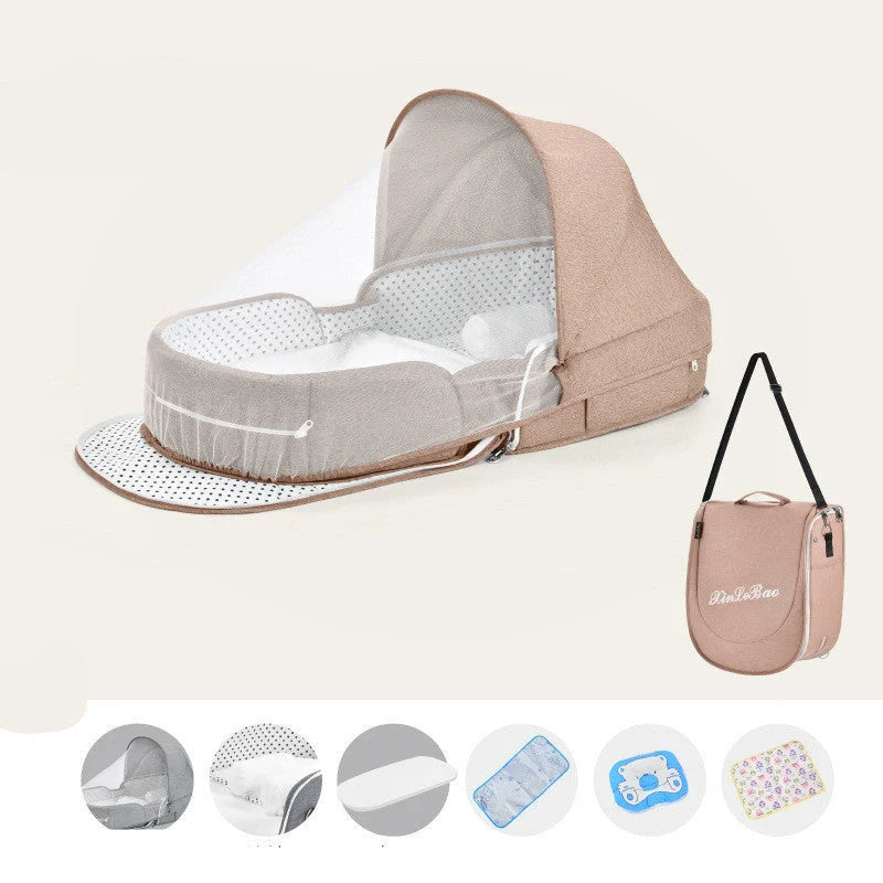 Portable baby crib with sun protection and mosquito net, foldable design for easy travel