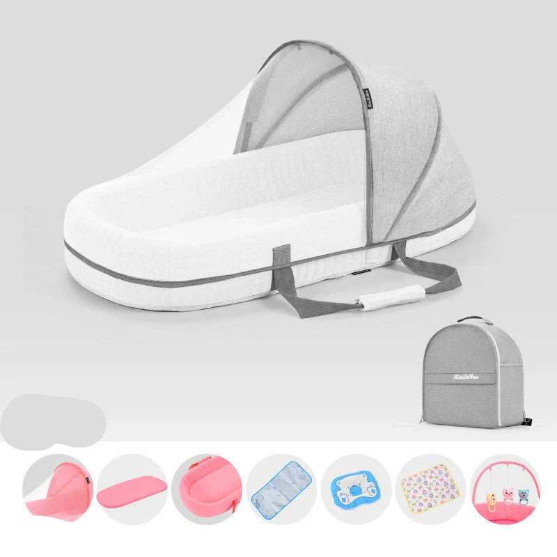 Portable baby crib with sun protection and mosquito net, foldable design for easy travel