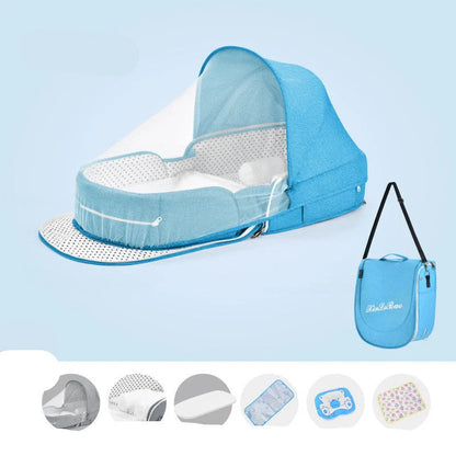 Portable baby crib with sun protection and mosquito net, foldable design for easy travel