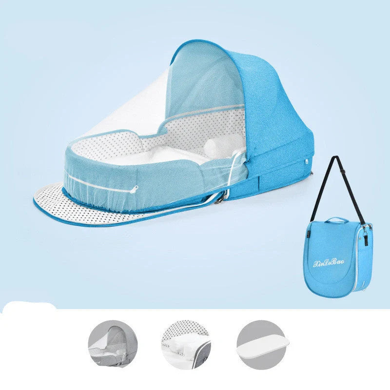 Portable baby crib with sun protection and mosquito net, foldable design for easy travel