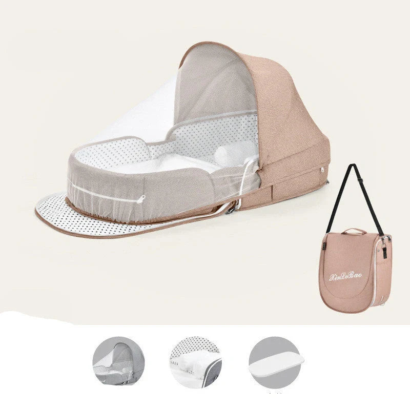 Portable baby crib with sun protection and mosquito net, foldable design for easy travel