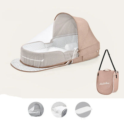 Portable baby crib with sun protection and mosquito net, foldable design for easy travel