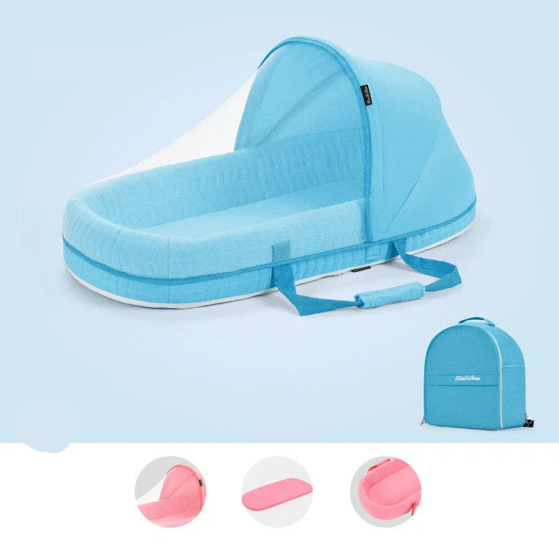 Portable baby crib with sun protection and mosquito net, foldable design for easy travel