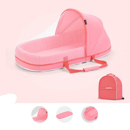 Portable baby crib with sun protection and mosquito net, foldable design for easy travel