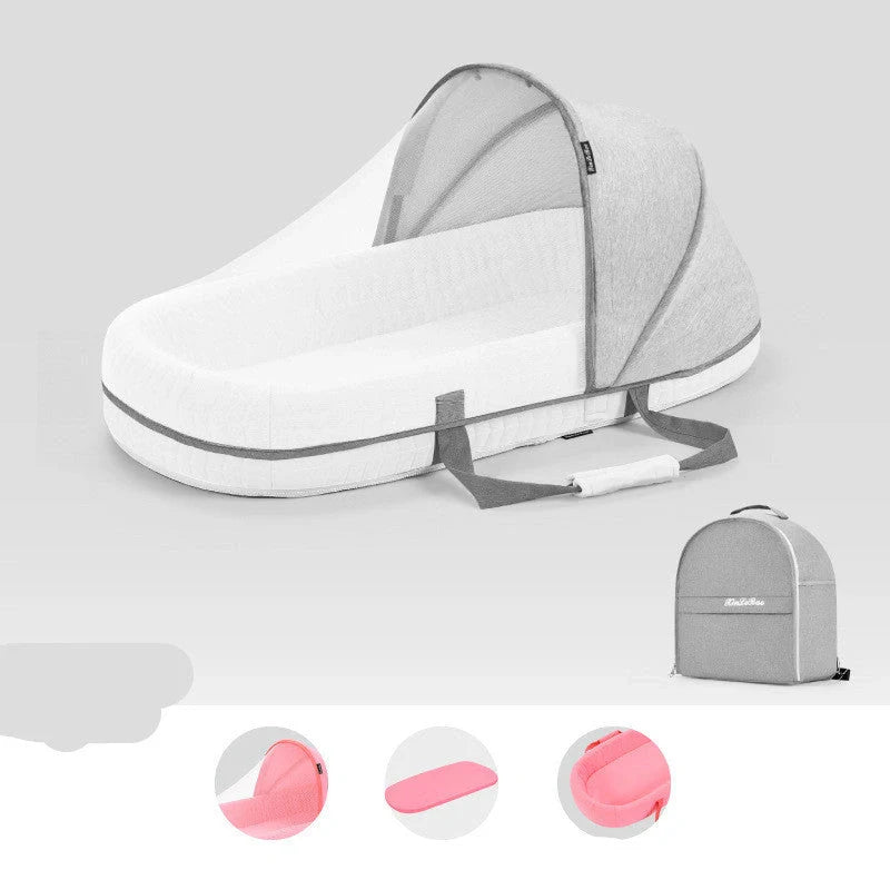 Portable baby crib with sun protection and mosquito net, foldable design for easy travel