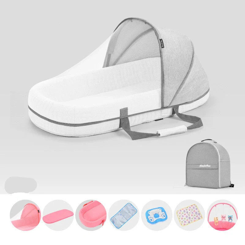 Portable baby crib with sun protection and mosquito net, foldable design for easy travel