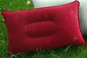 Rectangular PVC inflatable camping pillow showing dark blue colour with soft flocking texture and 38x24cm dimensions