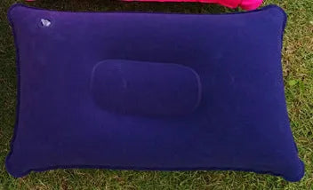 Rectangular PVC inflatable camping pillow showing dark blue colour with soft flocking texture and 38x24cm dimensions