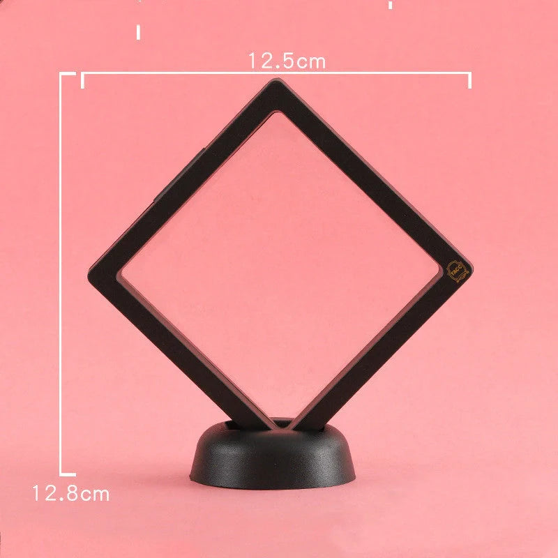 3D floating jewelry coin display stand in white and black, showcasing collectibles in mid-air