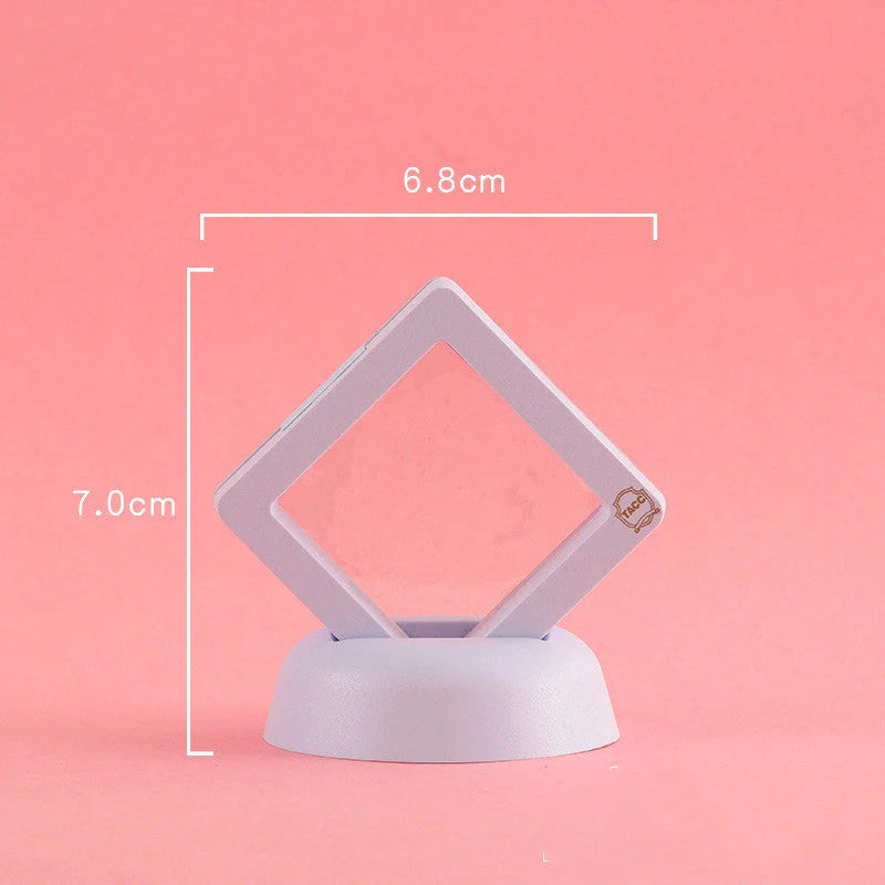 3D floating jewelry coin display stand in white and black, showcasing collectibles in mid-air