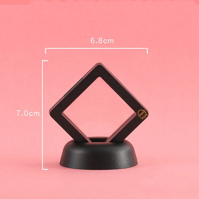 3D floating jewelry coin display stand in white and black, showcasing collectibles in mid-air