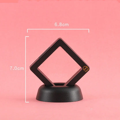 3D floating jewelry coin display stand in white and black, showcasing collectibles in mid-air