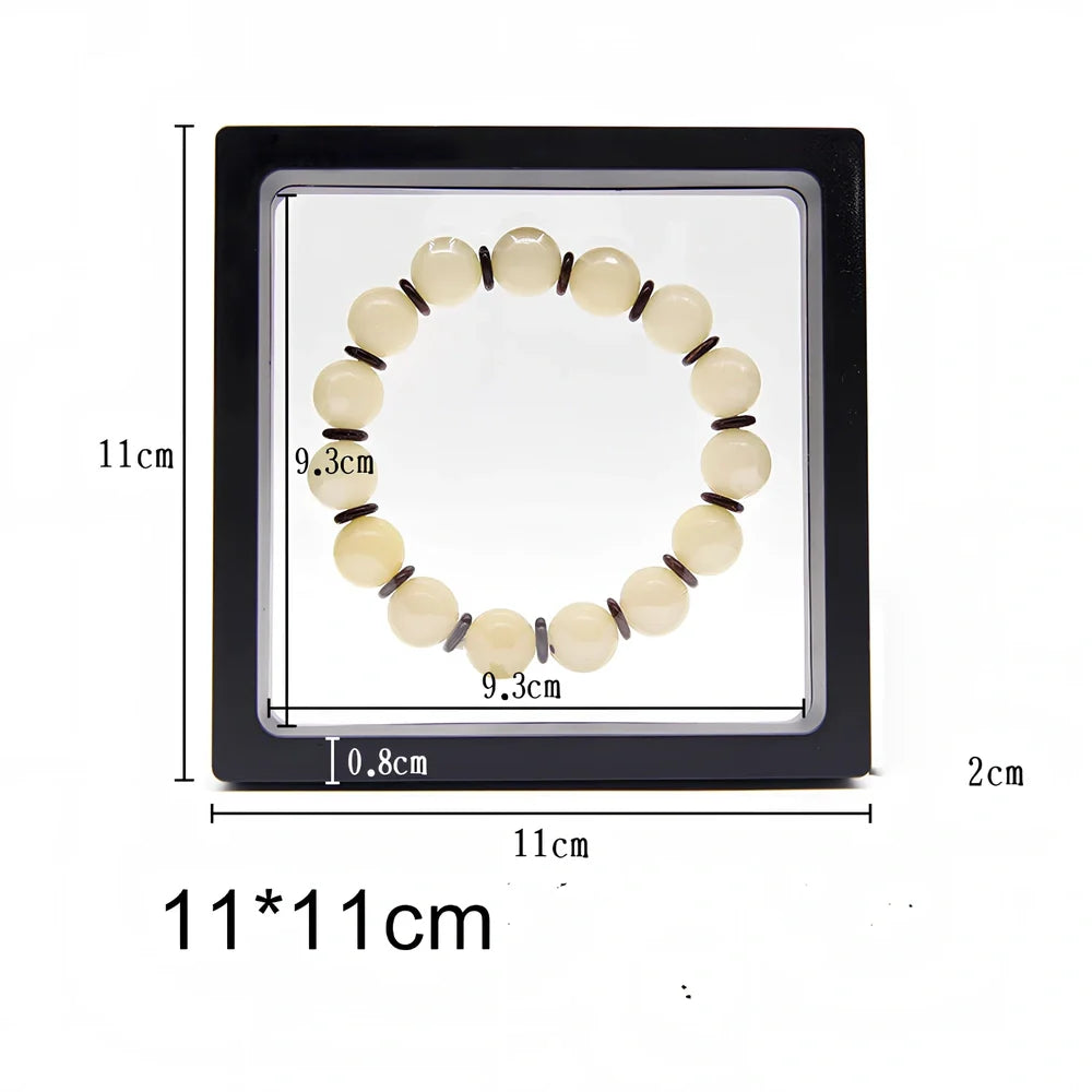 Black 11x11cm suspended 3D floating display frame holding a coin, with square base for stable collectible showcase