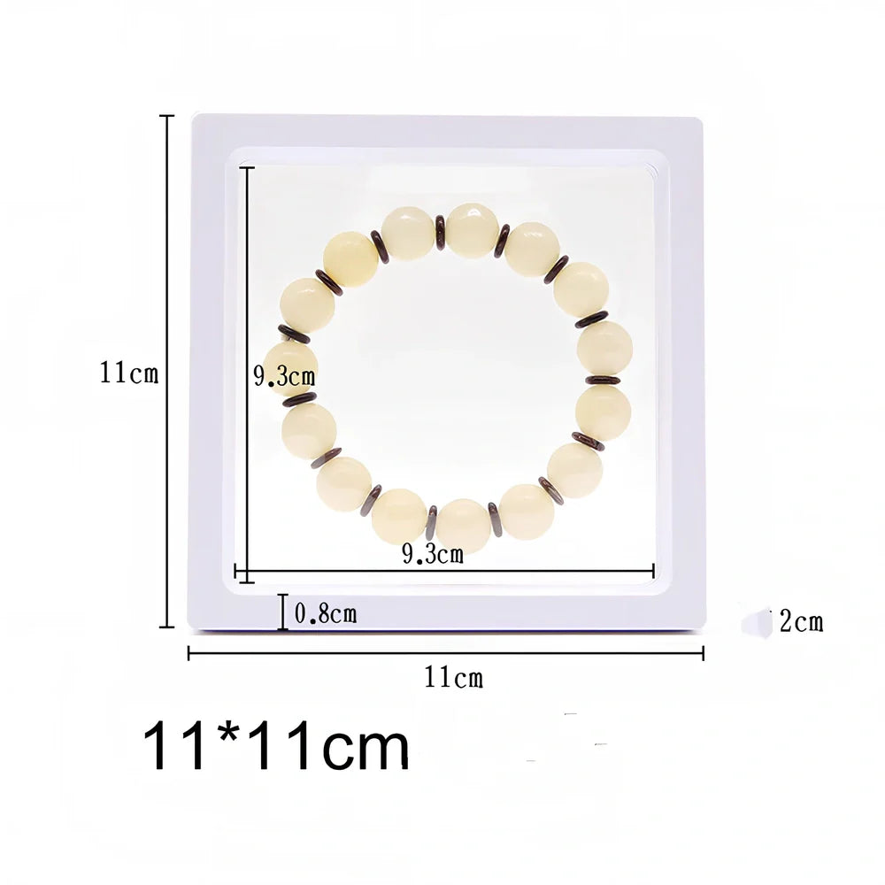 Black 11x11cm suspended 3D floating display frame holding a coin, with square base for stable collectible showcase
