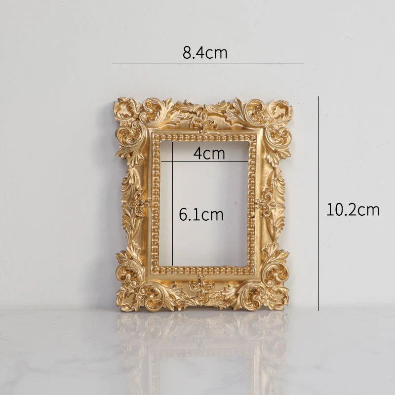 Golden retro photo frame for jewelry and art display in Nordic style