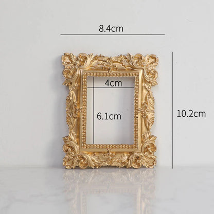 Golden retro photo frame for jewelry and art display in Nordic style