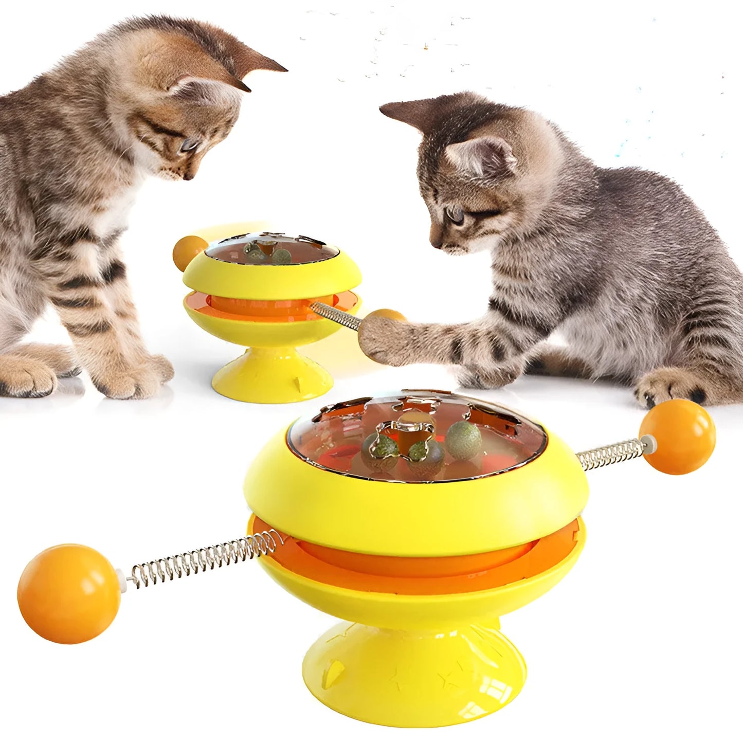 Rotating interactive cat toy with suction cup base and transparent catnip compartment