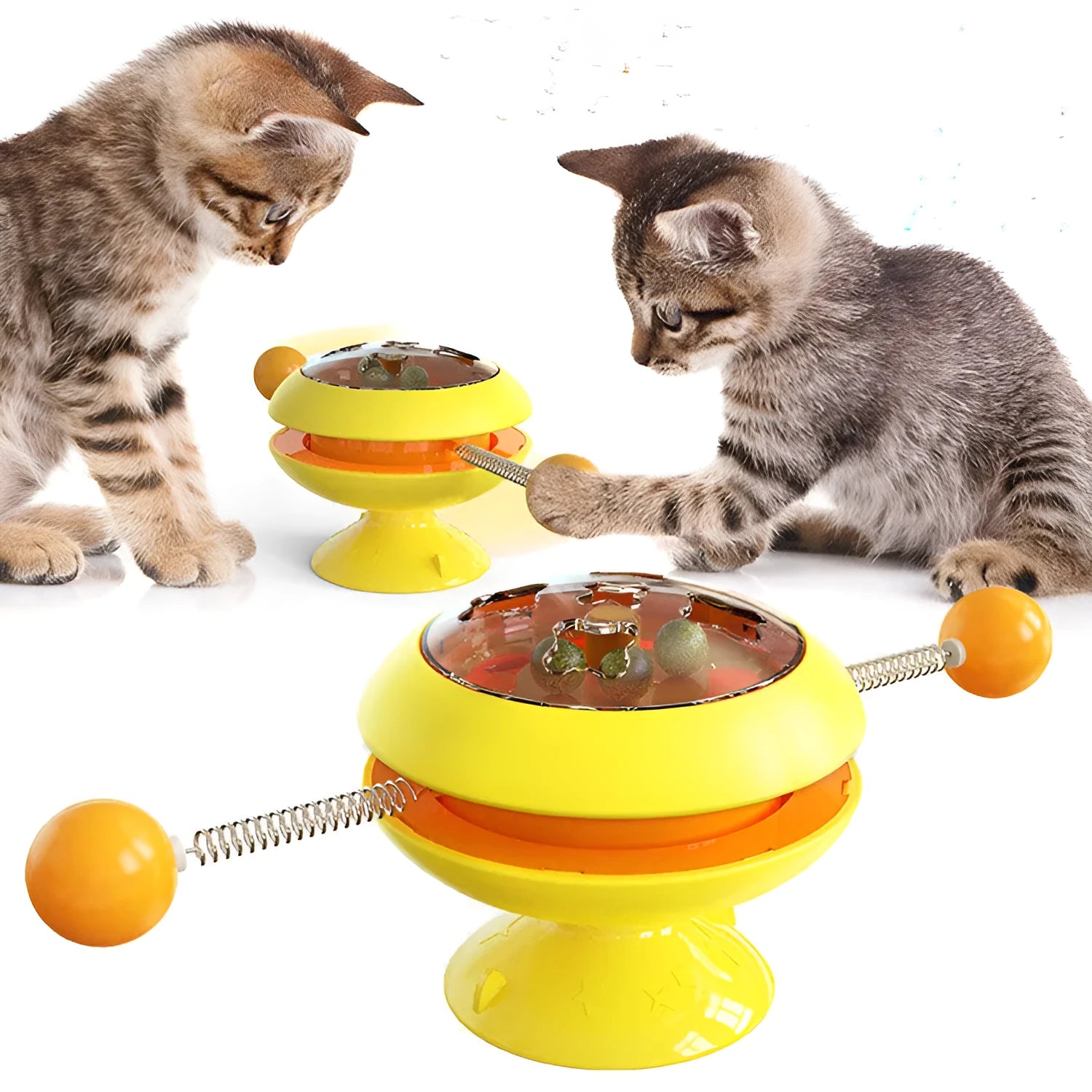Rotating interactive cat toy with suction cup base and transparent catnip compartment