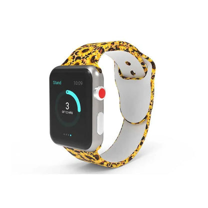 Apple Watch silicone band with colourful tie-dye pattern, shown attached to a watch and laid flat