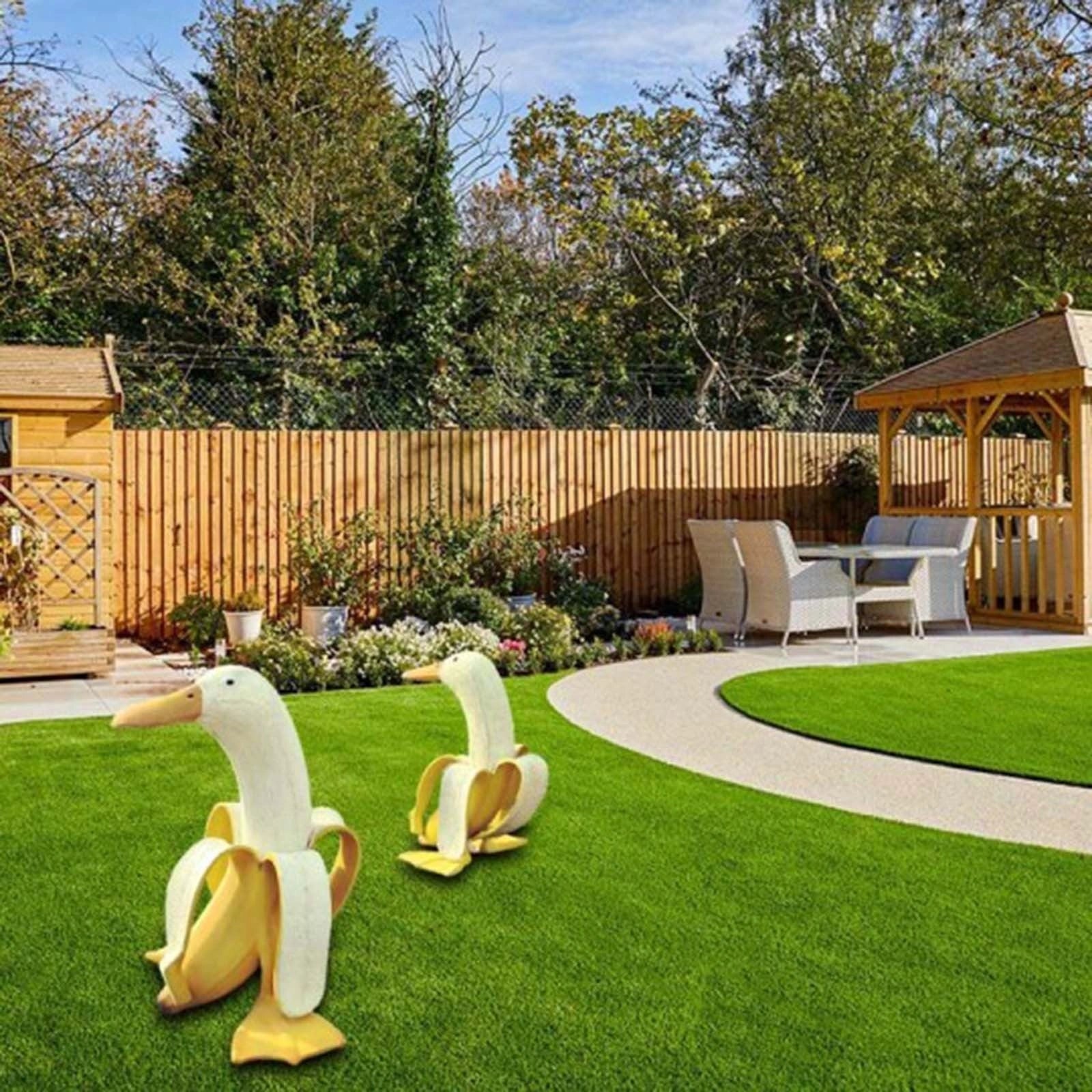 Vibrant yellow banana duck resin garden statue for outdoor decoration