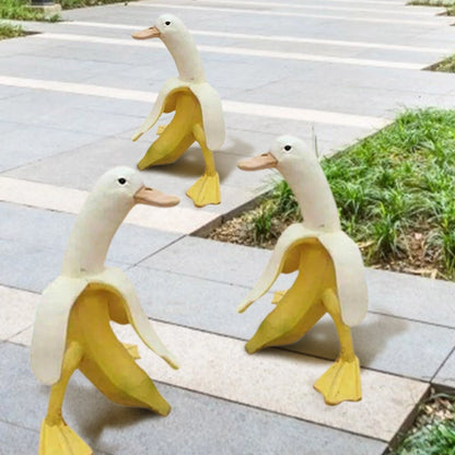 Vibrant yellow banana duck resin garden statue for outdoor decoration