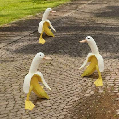 Vibrant yellow banana duck resin garden statue for outdoor decoration
