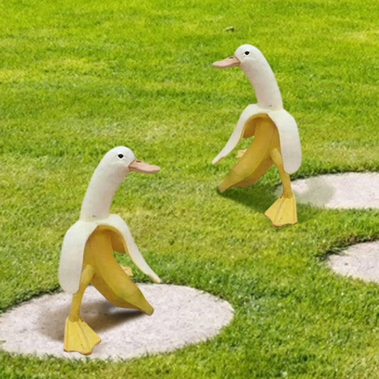 Vibrant yellow banana duck resin garden statue for outdoor decoration