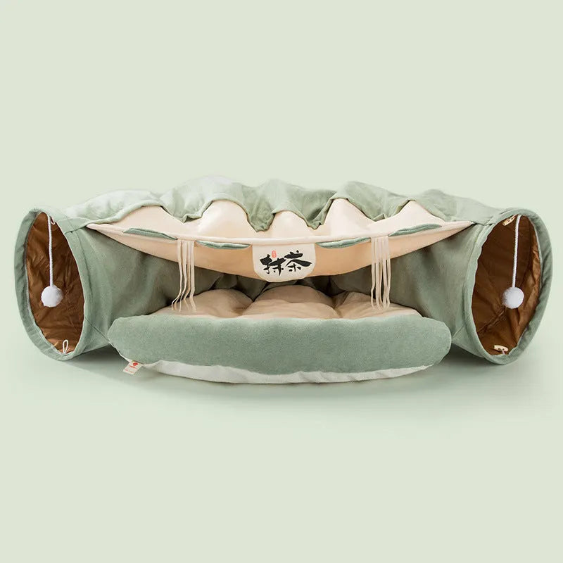 Collapsible cloth cat tunnel in pink colour, shown in both open and folded positions.