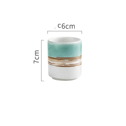 Japanese ceramic tea cup with kiln-fired pigmented glaze and external thread design