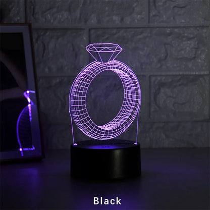 3D LED night light showing diamond ring stereogram with colour-changing illumination on acrylic surface
