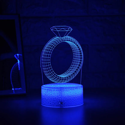 3D LED night light showing diamond ring stereogram with colour-changing illumination on acrylic surface