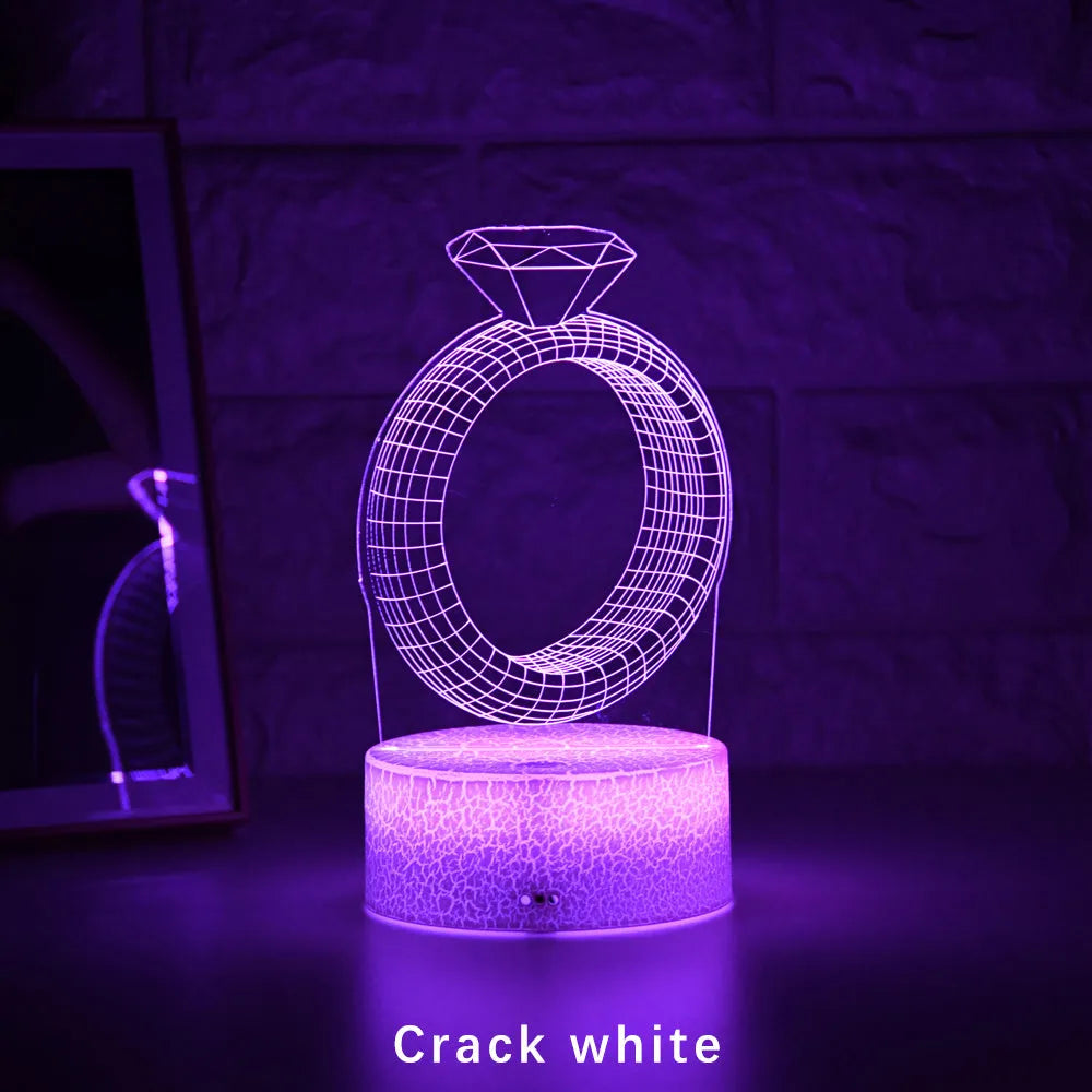 3D LED night light showing diamond ring stereogram with colour-changing illumination on acrylic surface